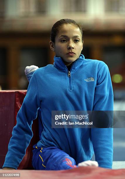 Jessica Lopez of Venezuela stretches during practice prior to the 2011 FIG Gymnastics World Cup at The Kelvin Hall on April 14, 2011 in Glasgow,...