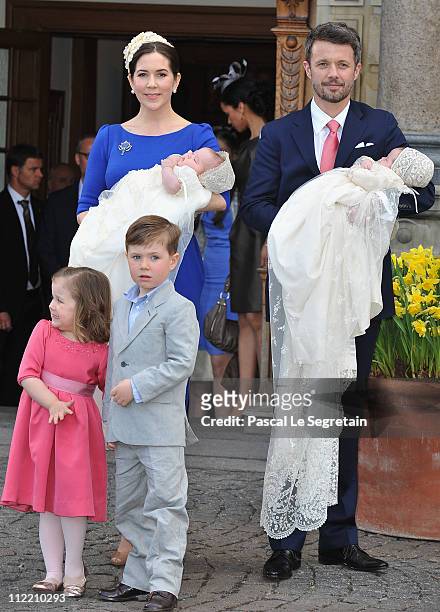 Crown Princess Mary and Crown Prince Frederik of Denmark with Princess Isabella and Prince Christian pose after the christening of their twins Prince...