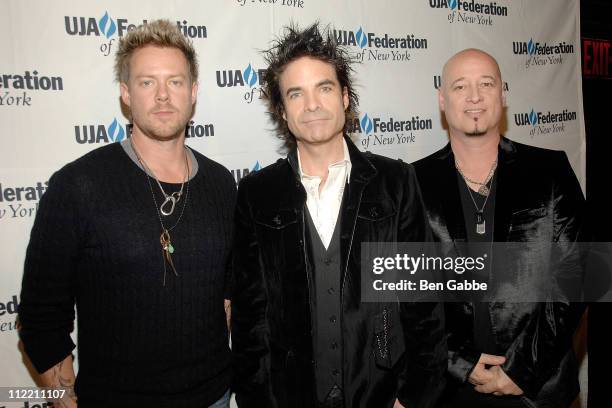 Scott Underwood, Patrick Monahan and Jimmy Stafford of Train attend the 2011 UJA-Federation of New York's Broadcast, Cable, and Video award...