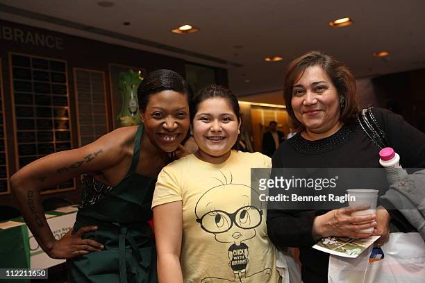 Suzanne Africa Engo, Jeniifer Morales and Mariana Beleran pose for a picture during Vegan Celebrity Activist Suzanne Africa Engo volunteers for...