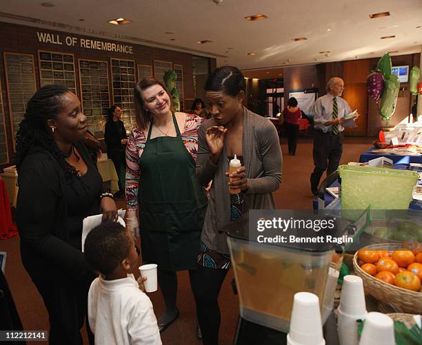 Vegan Celebrity Activist Suzanne Africa Engo volunteers for Garden State Market at Fit Families Forum against childhood obesity at Englewood Hospital...