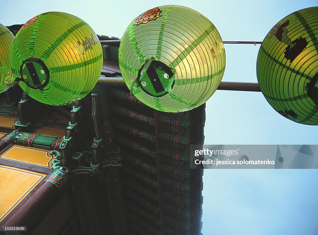 Green lanterns at temple