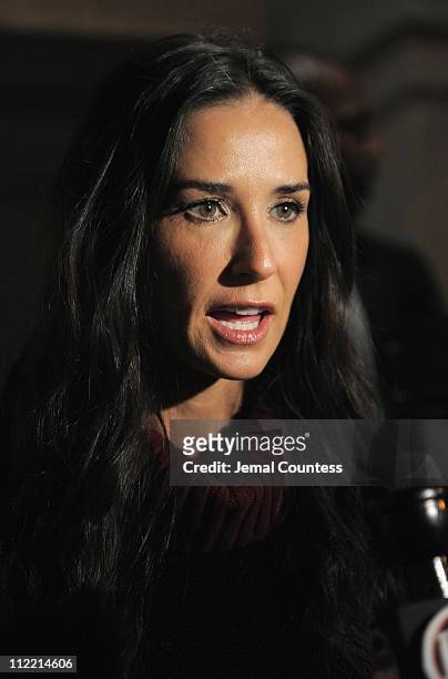 Actress Demi Moore speaks to the media at the launch party for "Real Men Don't Buy Girls" at Steven Alan Annex on April 14, 2011 in New York City.