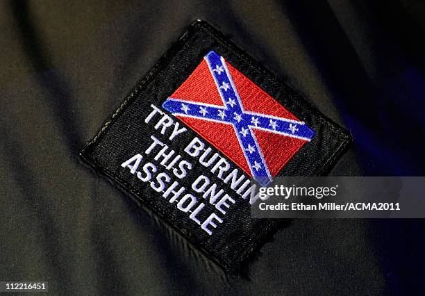 Patch is seen on recording artist Colt Ford's shirt as he performs during the Academy of Country Music Awards All-Star Jam at the MGM Grand...