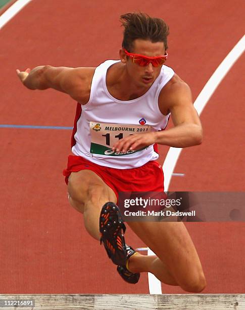 Brendan Cole of the AIS competes in the Mens 400 Metres Hurdles Open Preliminaries during day one of the Australian Athletics National Campionships...