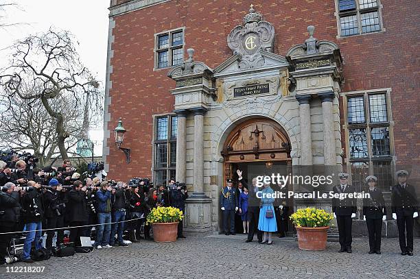 Queen Margrethe II of Denmark and Prince Henrik of Denmark pose after the christening of Crown Prince Frederik of Denmark's twins at Holmens Kirke on...