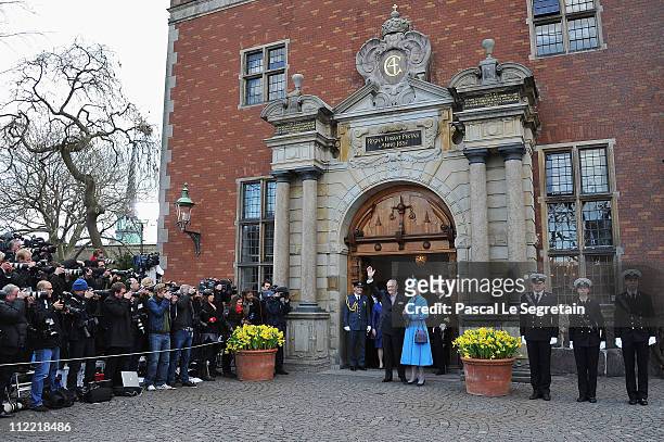 Queen Margrethe II of Denmark and Prince Henrik of Denmark pose after the christening of Crown Prince Frederik of Denmark's twins at Holmens Kirke on...