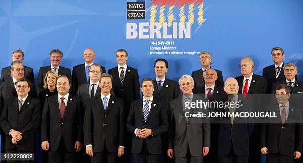 Foreign ministers including Germany's Guido Westerwelle , NATO Secretary General Anders Fogh Rasmussen and Britain's William Hague pose for a group...