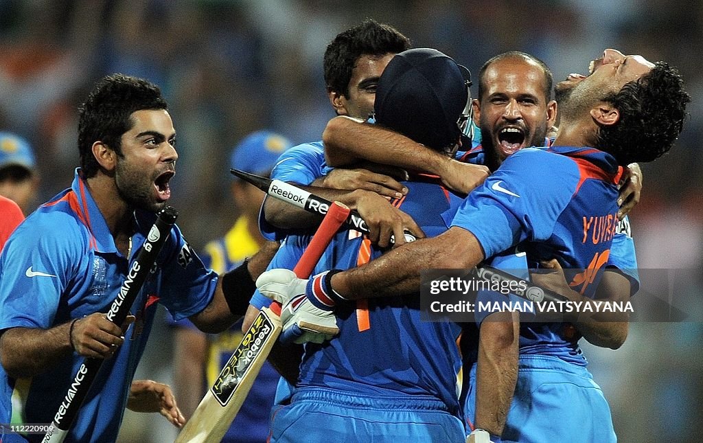 Indian cricketers celebrate after beatin