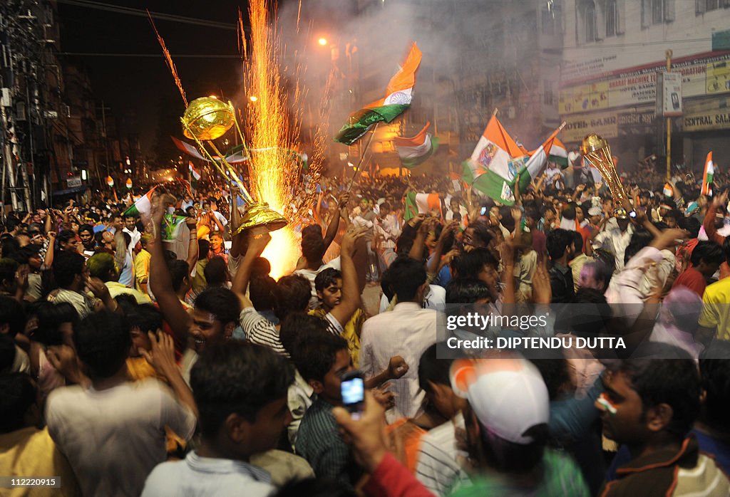 Indian cricket fans celebrate victory ov
