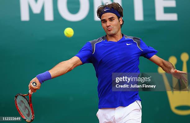 Roger Federer of Switzerland plays a forehand in his match against Jurgen Melzer of Austria during Day Six of the ATP Masters Series Tennis at the...