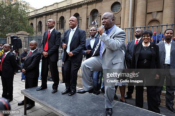 President Julius Malema dances while addressing supporters outside the Johannesburg high court where ANCYL leader Julius Malema appeared for a fourth...
