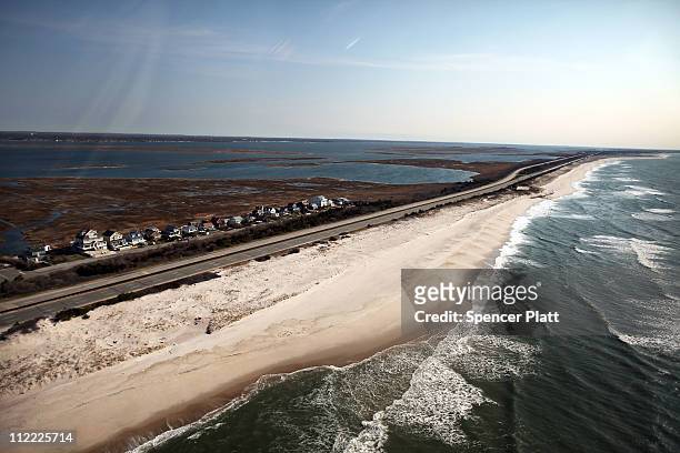 An aerial view of the area near Gilgo Beach and Ocean Parkway on Long Island where police have been conducting a prolonged search after finding ten...