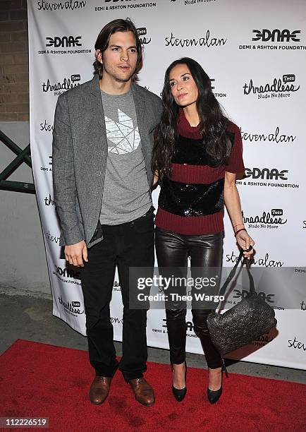 Ashton Kutcher and Demi Moore attend the launch party for "Real Men Don't Buy Girls" at Steven Alan Annex on April 14, 2011 in New York City.