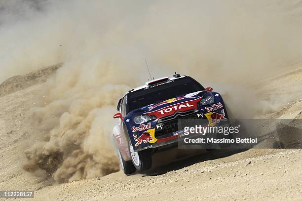 Sebastien Loeb of France and Daniel Elena of Monaco compete in their Citroen Total WRT Citroen DS3 WRC during Day 1 of the WRC Rally Jordan on April...