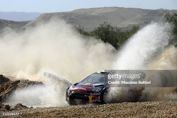 Sebastien Ogier of France and Julien Ingrassia of France compete in their Citroen Total WRT Citroen DS3 WRC during Day 1 of the WRC Rally Jordan on...