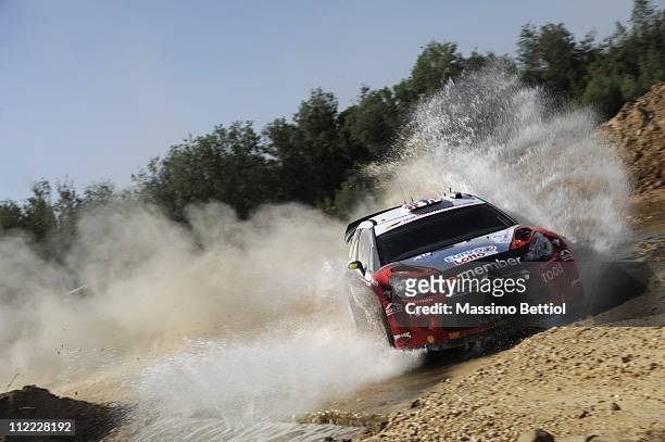 Petter Solberg of Norway and Chris Patterson of Great Britain compete in their Petter Solberg WRT Citroen DS3 WRC during Day 1 of the WRC Rally...