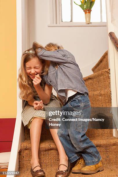 kids playing on stairs - play fight stock pictures, royalty-free photos & images