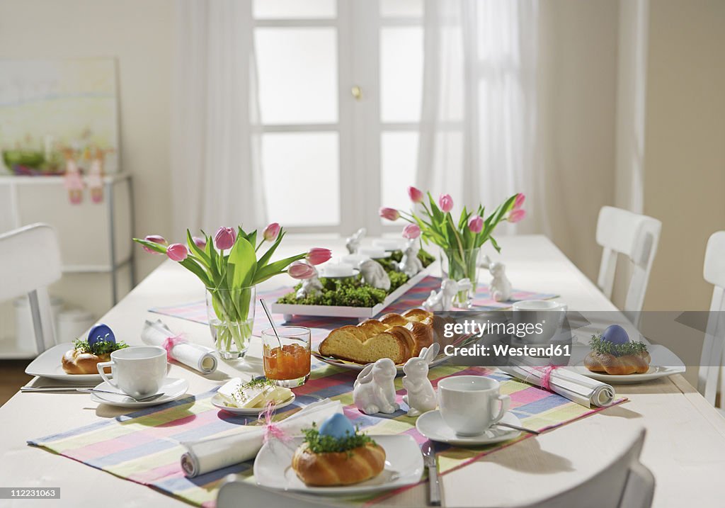 Dining table with easter breakfast setting