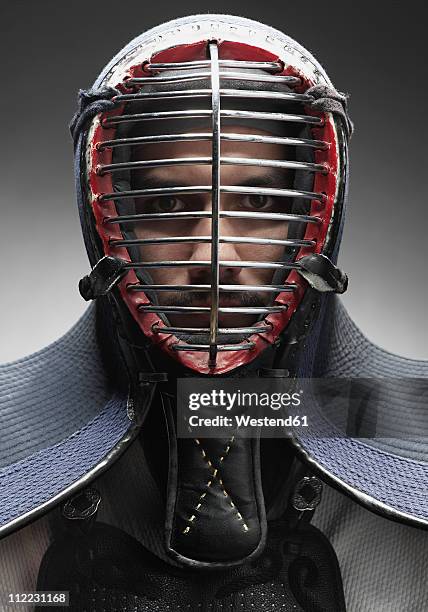 kendo fighter with face mask, portrait - face guard sport stock pictures, royalty-free photos & images