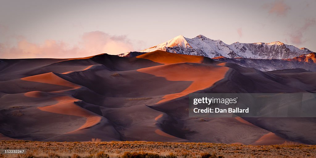 Sand dunes and mountain peaks. Great Sand Dune National Park, Alamosa, Colorado.