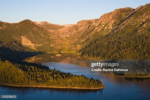 an aerial view of emerald bay at sunrise in lake tahoe, california. - emerald bay lake tahoe stock pictures, royalty-free photos & images