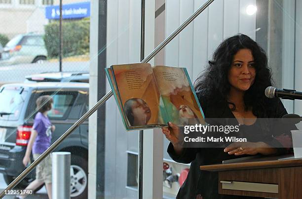 Maya Soetoro-Ng reads from her children's book "Ladder to the Moon" at the Tenley-Friendship Neighborhood Library on April 15, 2011 in Washington,...