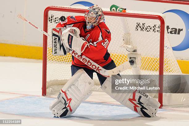 Michal Neuvirth of the Washington Capitals makes a save during Game Two of the Eastern Conference Quarterfinals of the 2011 NHL Stanley Cup Playoffs...