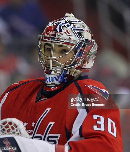 Michal Neuvirth of the Washington Capitals takes a break in the first period in the game against the New York Rangers in Game Two of the Eastern...