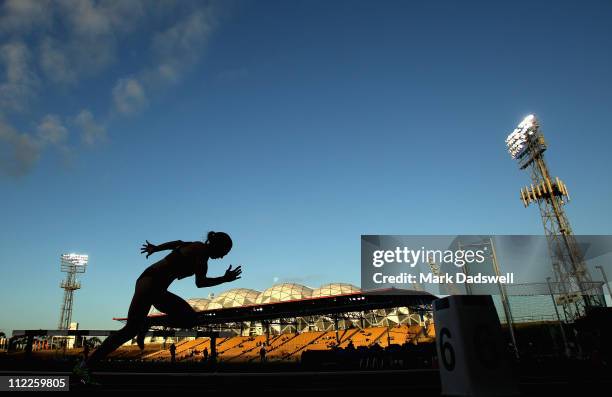 Tamsyn Lewis of VIC jumps out of the starting blocks in her heat of the Womens 400 Metres Open Semi Finals during day two of the Australian Athletics...