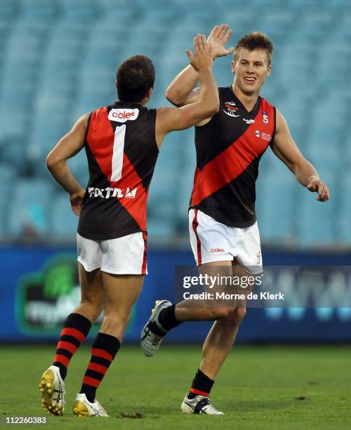 Fortunato Caruso and Aaron Fielke of West Adelaide celebrate after