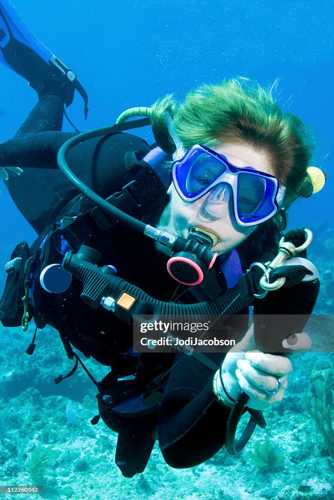 Diver demonstrating scuba diving skills