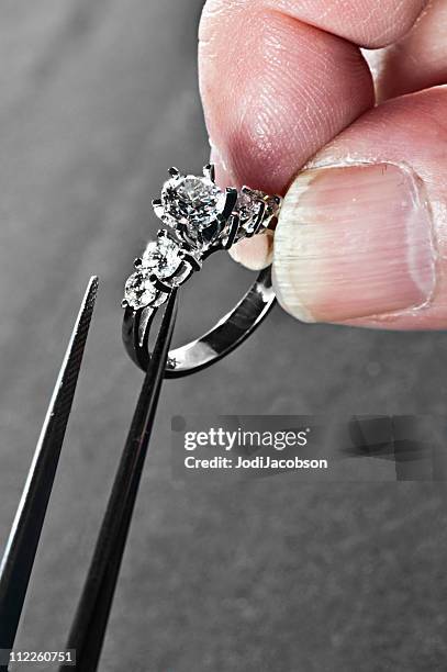 retail - service: diamond ring remount - diamond jeweller stock pictures, royalty-free photos & images