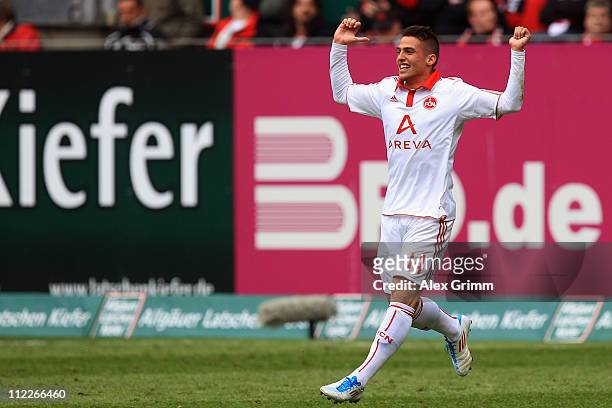 Robert Mak of Nuernberg celebrates his team's second goal during the Bundesliga match between 1. FC Kaiserslautern and 1. FC Nuernberg at...