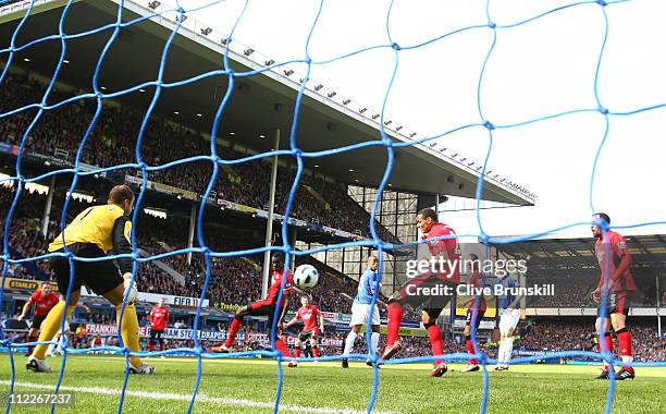 Leon Osman of Everton scores the first goal during the Barclays Premier League match between Everton and Blackburn Rovers at Goodison Park on April...