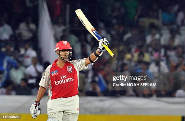 Kings XI Punjab batsman Paul Valthaty raises his bat for his fifty during the IPL twenty 20 match between Deccan Chargers and Kings XI Punjab at the...