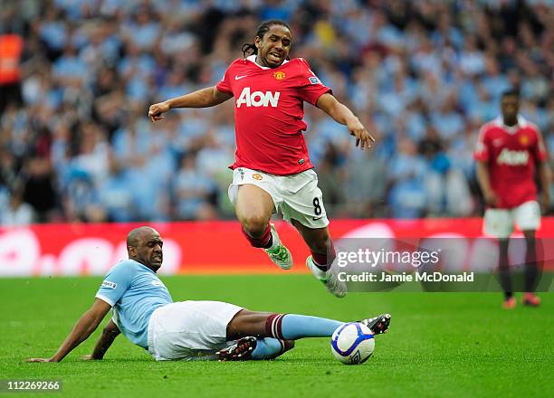 Patrick Vieira of Manchester City tackles Anderson of Manchester United during the FA Cup sponsored by E.ON semi final match between Manchester City...