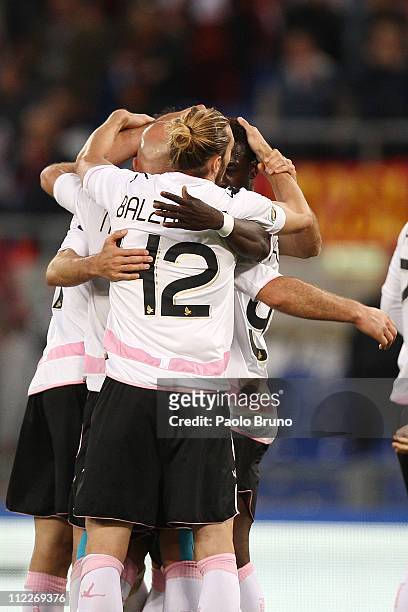 Citta di Palermo players celebrate their 3-2 victory after the Serie A match between AS Roma and US Citta di Palermo at Stadio Olimpico on April 16,...