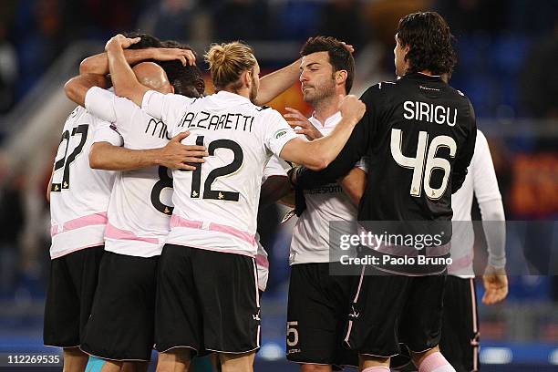 Citta di Palermo players celebrate their 3-2 victory after the Serie A match between AS Roma and US Citta di Palermo at Stadio Olimpico on April 16,...