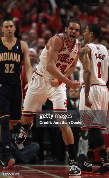 Joakim Noah of the Chicago Bulls celebrates two blocked shots in the final seconds against the Indiana Pacers in Game One of the Eastern Conference...