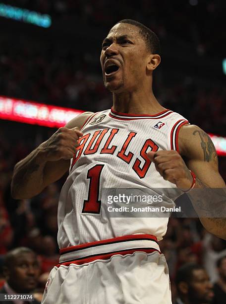 Derrick Rose of the Chicago Bulls pounds his chest after hitting a shot against the Indiana Pacers in Game One of the Eastern Conference...