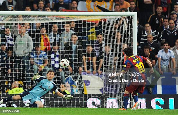 Lionel Messi of Barcelona beats Real Madrid's goalkeeper Iker Casillas from the penalty spot to score Barcelona's opening goal tduring the La Liga...
