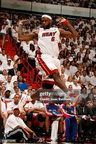 LeBron James of the Miami Heat reacts during a game against the Philadelphia 76ers in Game One of the Eastern Conference Quarterfinals between the...