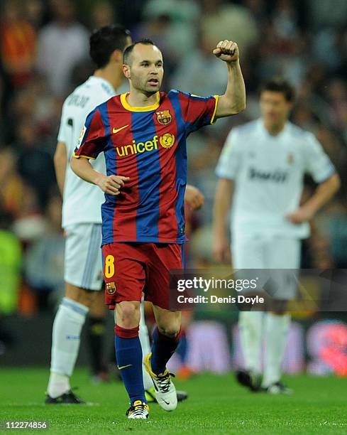 Andres Iniesta of Barcelona celebrates after Barcelona scored a goal during the La Liga match between Real Madrid and Barcelona at Estadio Santiago...