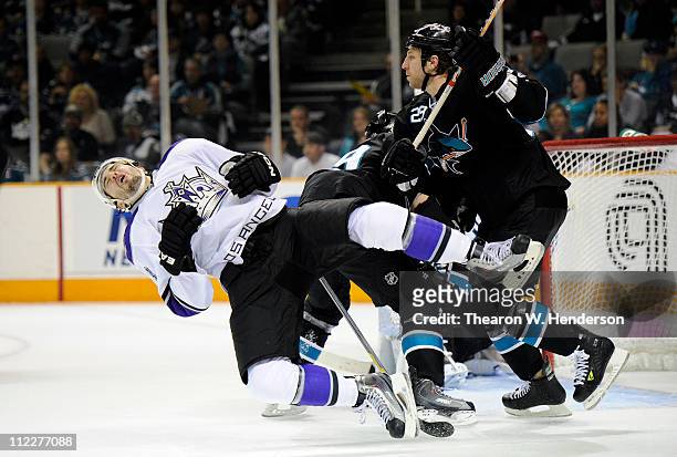 Ryane Clowe the San Jose Sharks gets a penalty for cross checking Drew Doughty of the Los Angeles Kings in Game Two of the Western Conference...