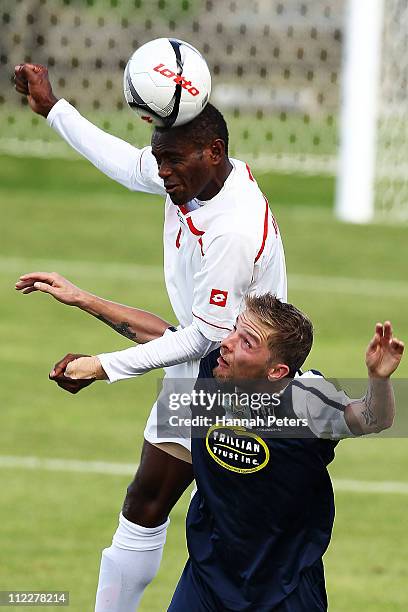 Selwyn Sese Ala of Amicale competes with David Mulligan of Auckland City for the ball during the O-League Grand Final match between Auckland City and...