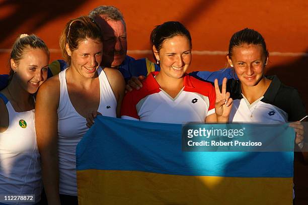 Team Ukraine celebrate after winning during day two of the Federation Cup World Group Playoff tie between Australia and Ukraine at Glen Iris Valley...