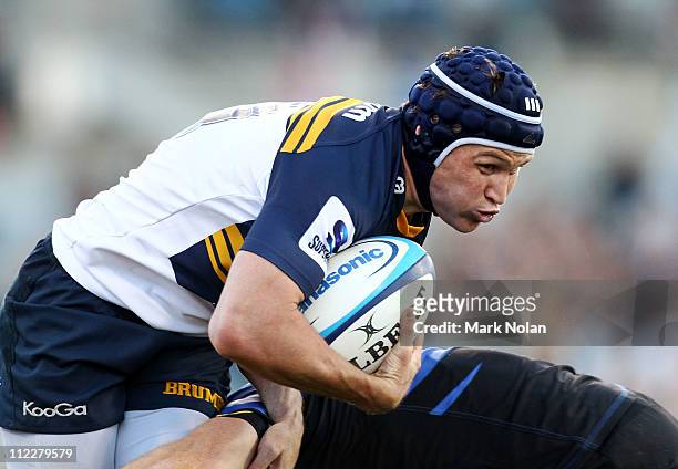Matt Giteau of the Brumbies is tackled during the round nine Super Rugby match between the Brumbies and the Force at Canberra Stadium on April 17,...