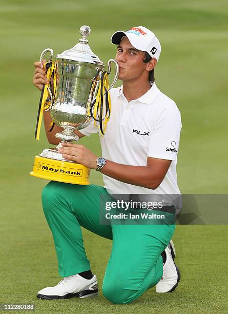 Matteo Manassero of Italy with the trophy after winning of the Maybank Malaysian Open at Kuala Lumpur Golf & Country Club on April 17, 2011 in Kuala...