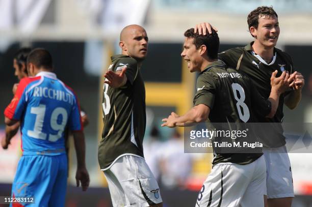 Hernanes of Lazio celebrates with teeam-mates after scoring the opening goal of the Serie A match between Catania Calcio and SS Lazio at Stadio...